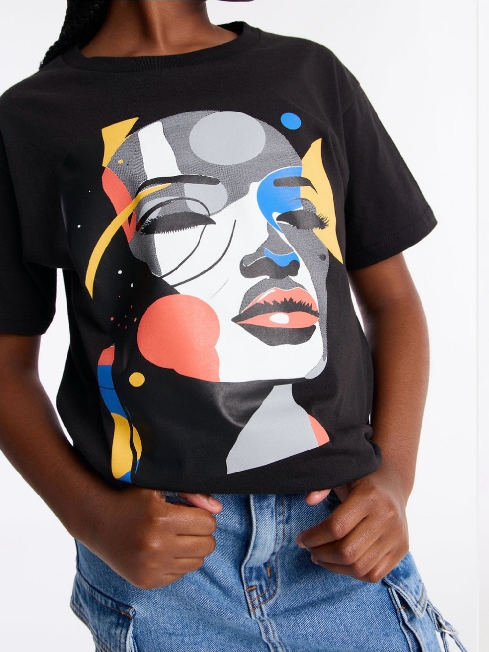 NWT Fashion Nova Black Graphic Face Print Tee with Yellow & Blue Accents